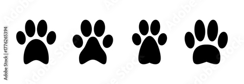 Paw icon vector illustration. paw print sign and symbol. dog or cat paw