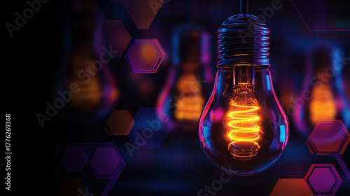 Bright light bulb with glowing filament against dark background, showcasing innovation