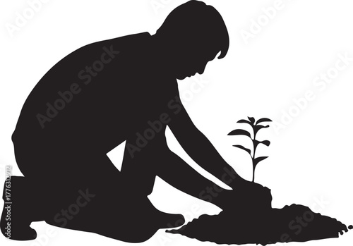 Silhouette of Person Planting Young Tree Symbolizing Growth and Environmental Care