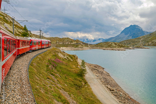 Bernina Express glides from Tirano to St. Moritz, treating passengers to panoramic alpine landscapes and charming villages. Stunning views make this one of the most scenic train journeys in the world