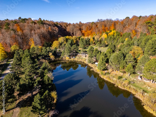 Autumn landscape in Domanic, Kutahya, Turkiye with lake and winding road