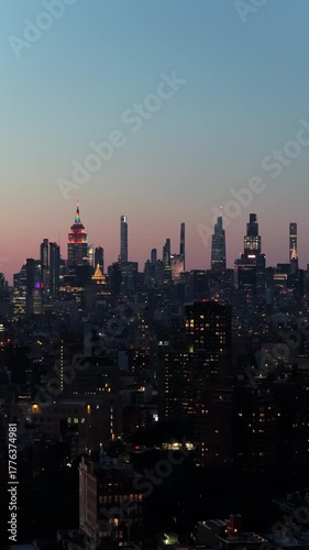 Wallpaper Mural silky gradient sunset over peaceful urban skyline dotted with radiant skyscrapers and scattered Torontodigital.ca