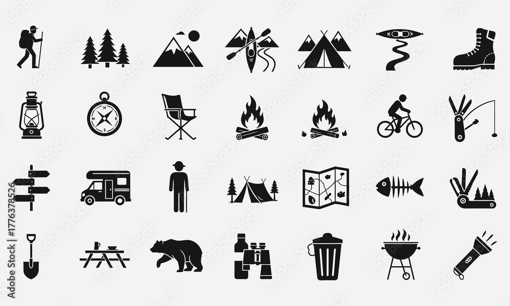 Fototapeta premium A comprehensive set of solid black glyph icons representing camping, hiking, and various outdoor adventure activities and equipment