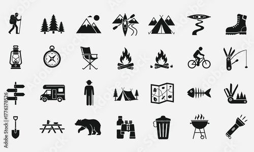 A comprehensive set of solid black glyph icons representing camping, hiking, and various outdoor adventure activities and equipment