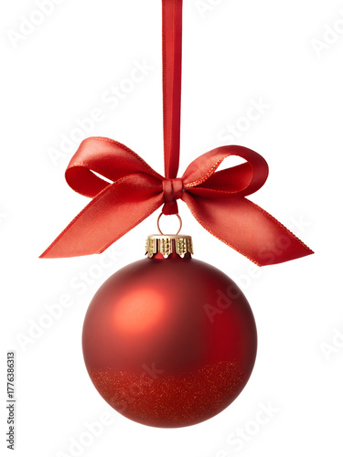 A vibrant red matte Christmas ornament with a sparkling glitter base and a delicate ribbon bow hangs isolated on a transparent background.