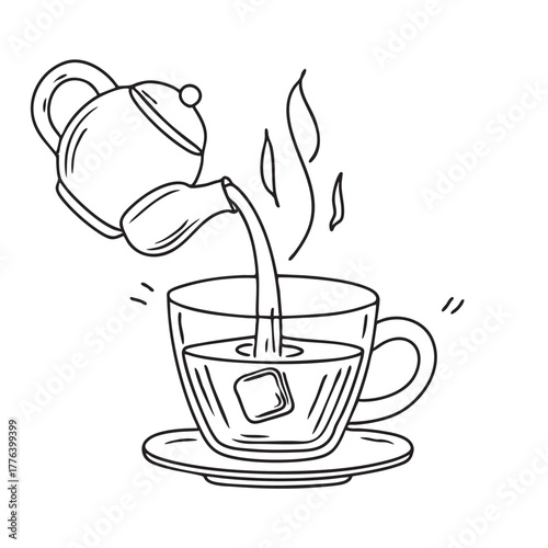 Glass cup of strong hot tea poured from high angle