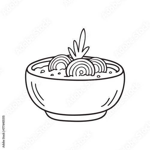 Clay bowl filled with stew of onions and herbs