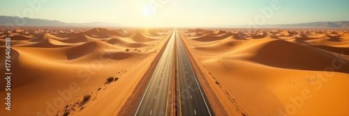 Empty desert highway, sun-baked sand, aerial view, wind, geography