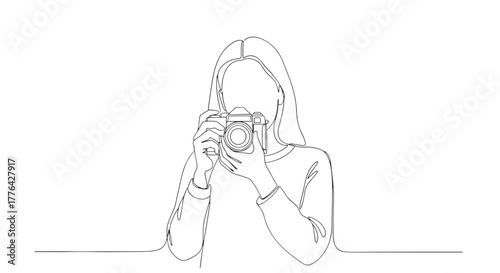 Continuous line drawing of a woman holding a camera up to her face taking a photograph in black and white