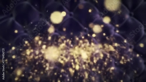 Abstract golden bokeh lights sparkling on dark textured background  