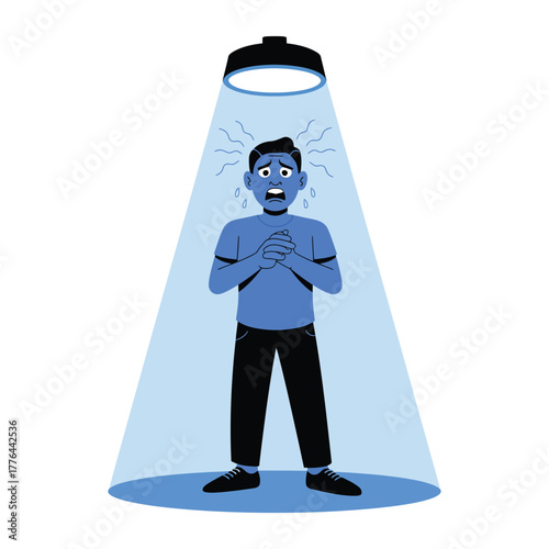 A person stands nervously in a spotlight, feeling anxious and overwhelmed.