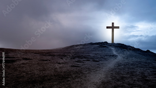 Fotografie Path toward Christian cross on the hill with dark dramatic sky background