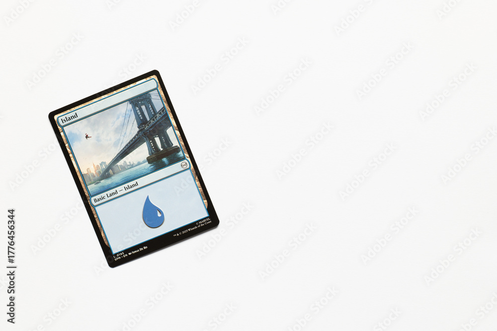 Obraz premium Bradford, UK Nov 3 2025 Basic Land Island Spider-man card magic the gathering card shot isolated on a white paper background.