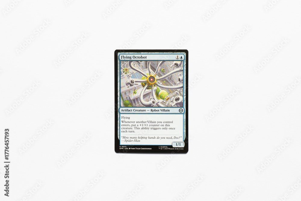 Naklejka premium Bradford, UK Nov 3 2025 Flying Octobot card from the Spider-man magic the gathering card game shot isolated on a white paper background.