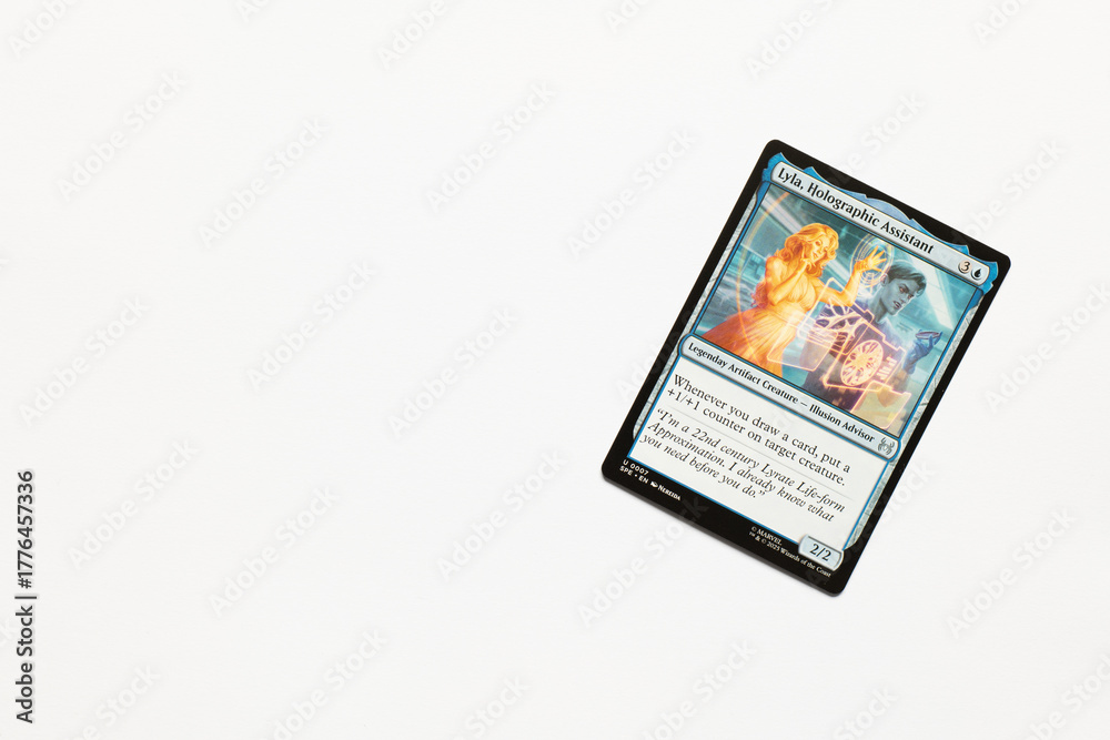 Fototapeta premium Bradford, UK Nov 3 2025 Lyla, Holographic Assistant card from the Spider-man magic the gathering card shot isolated on a white paper background.