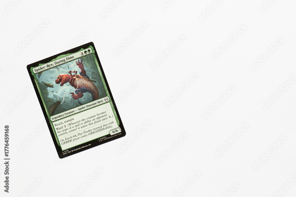 Fototapeta premium Bradford, UK Nov 3 2025 Spider-Rex, Daring Dino card from Spider-man magic the gathering shot isolated on a white paper background.