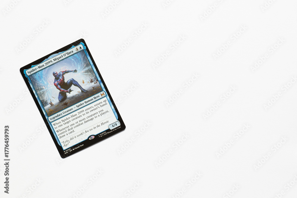 Naklejka premium Bradford, UK Nov 3 2025 Spider-man 2099 Miguel O'Hara magic the gathering card shot isolated on a white paper background.