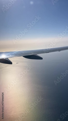 Aerial view from flight, stunning landscapes, mountains, rivers, coastlines, and clouds