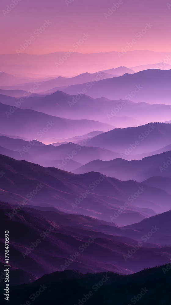 Fototapeta premium Gradient purple mountain peaks with morning mist and pink sky