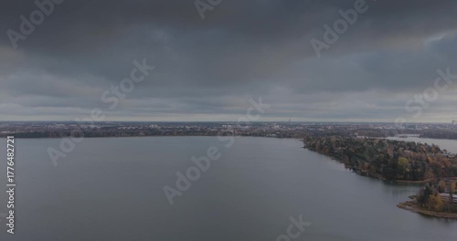 Aerial panorama over Espoo lagoons with distant view of Helsinki on the horizon