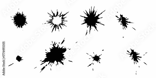 Collection of black ink splatter and splash brush stroke elements on white background