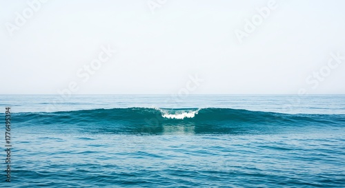 Fototapeta Naklejka Na Ścianę i Meble -  Ocean wave breaking on calm sea