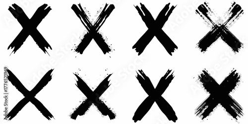 Collection of eight black hand drawn brush stroke letter x symbols on white background