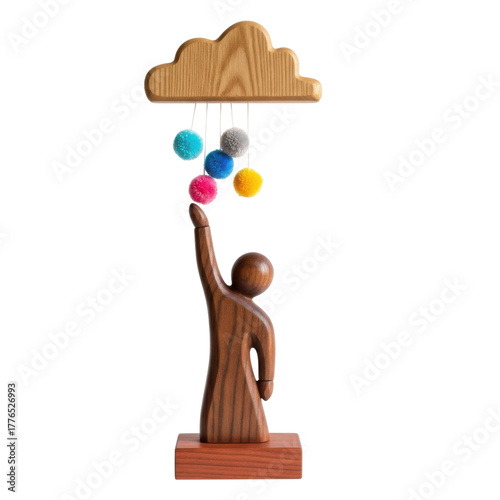 Wooden figurine reaching for colorful pompoms hanging from a cloud