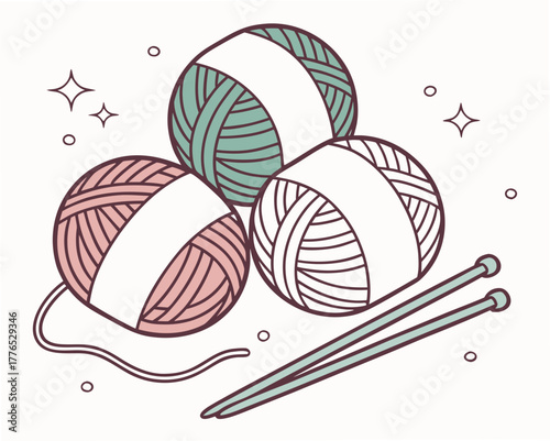 Three yarn balls with knitting needles