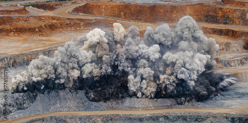 Valokuva Large explosion dynamite at open pit mine during blasting operation, industry pa