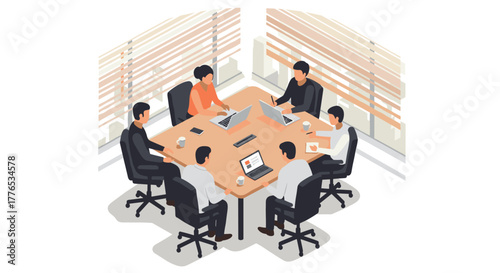 Collaborative office meeting around conference table with laptops and documents