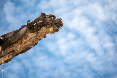 Prague, Czech Republic, August 8, 2023. Close-up view of a gargoyle on St. Vitus Cathedral. Beautiful summer day. Travel destinations.