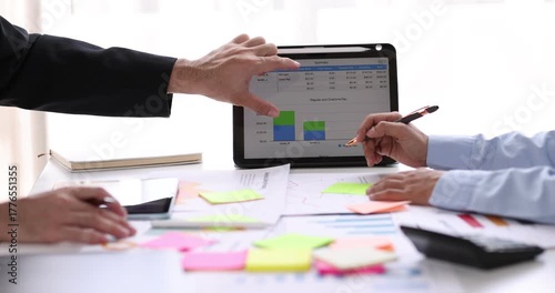 Business man investment consultant analyzing company annual financial report balance sheet statement working with documents graphs. Concept picture of business, market, office, tax.
