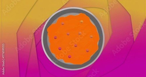 Displaying metallic pan holding orange paste on gradient background, with purple and yellow spheres