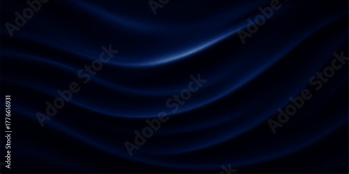 Smooth black silk and satin fabric with a flowing wave texture creating an elegant backdrop and pattern