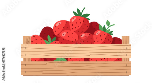 Fresh strawberries overflowing from a wooden crate ready for sale and consumption.