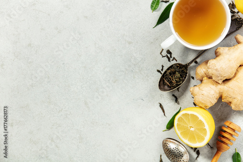 Herbal Tea with Ginger, Lemon, and Honey on Light Background