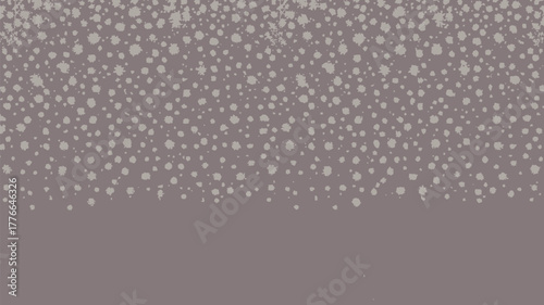 A light gray background with many small white spots fading into a solid gray color at the bottom