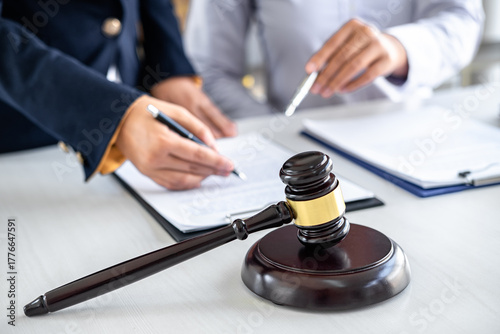 Consultation and conference of female lawyers and professional businesswoman working and discussion having at law firm in office. Concepts of law, Judge gavel with scales of justice