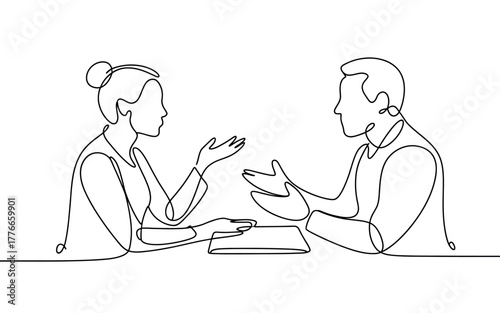 Two people engaged in a lively discussion, sharing ideas and collaborating.