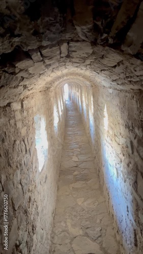 Medieval stone tunnel Kamianets-Podilskyi Fortress, architecture, corridor, light, texture, arch, travel, history, ancient heritage