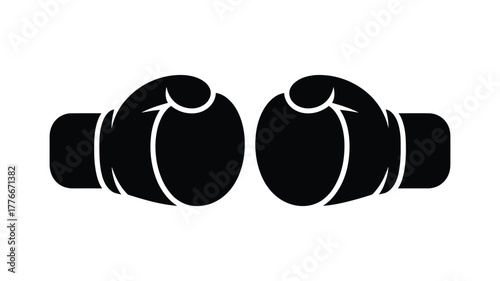 Pair of black boxing gloves facing each other