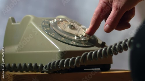 Making a call on vintage rotary dial phone 