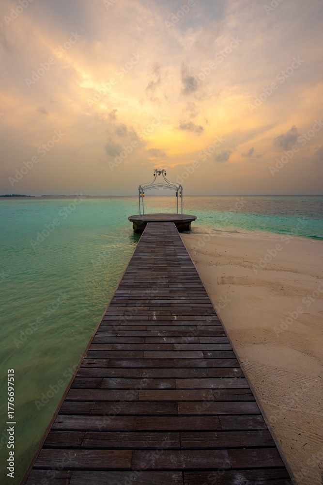 Obraz premium Tranquil closeup calm sea water waves with palm trees. Beautiful Sunset Panorama, Tropical island beach landscape exotic shore coast. Summer vacation, holiday amazing nature. Relax paradise, Maldives.