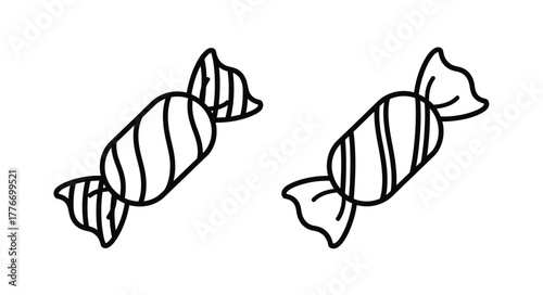 Simple black and white illustration of two wrapped hard candies shown