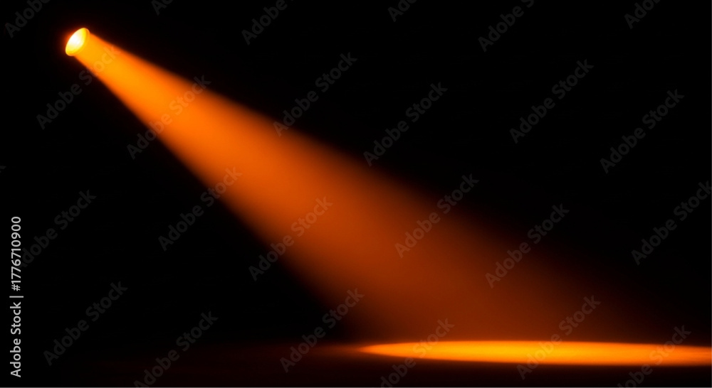 Fototapeta premium A captivating beam of warm orange light illuminates an empty stage against a deep black backdrop. The vibrant glow evokes a sense of anticipation and drama. vector illustration