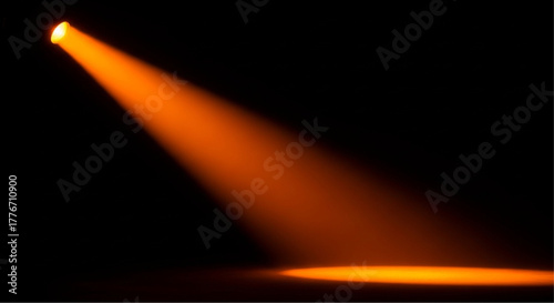 A captivating beam of warm orange light illuminates an empty stage against a deep black backdrop.  The vibrant glow evokes a sense of anticipation and drama. vector illustration