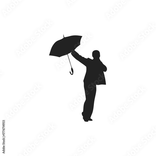 silhouette of person holding umbrella