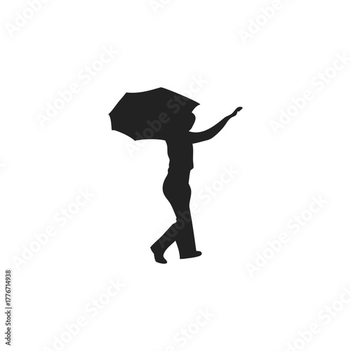 silhouette of person holding umbrella