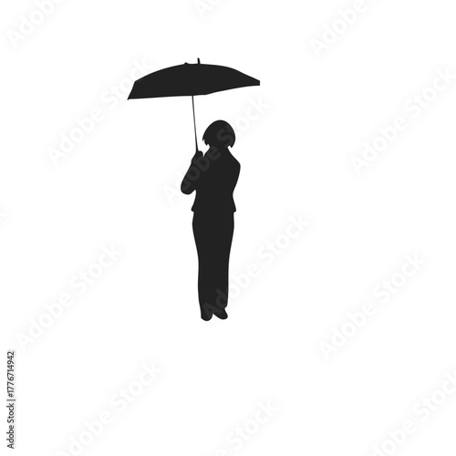 silhouette of person holding umbrella